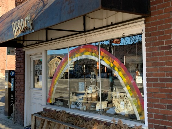 Rainbow painted on storefront window