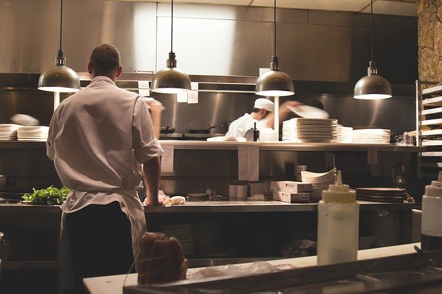 workers in restaurant kitchen