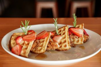 Crosby's Kitchen & Cocktail, Fried Chicken & Waffles with 2 Eggs, House Made Maple Bourbon Syrup, Rosemary