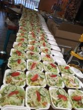 Lines of packaged meals ready for delivery
