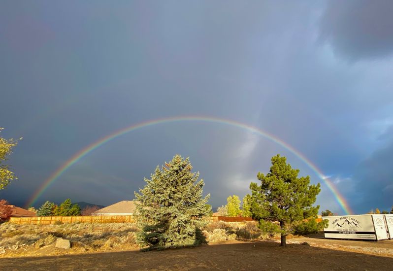 Rainbow over two Sierra Mobile Storage containers